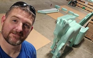 VyStar employee Joseph with a sculptured styrofoam horse